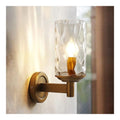 Solution lumineuse Dore et Ambre au dessin sobre en format applique murale 40 W E14